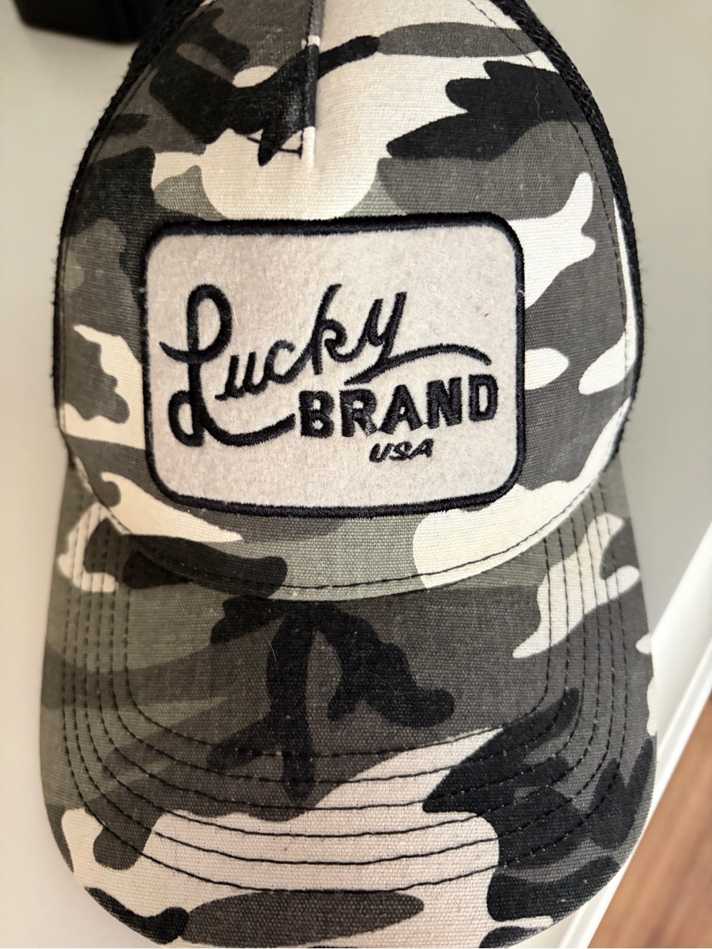 Lucky Brand Camo Trucker Hat in Green, Black, Cream